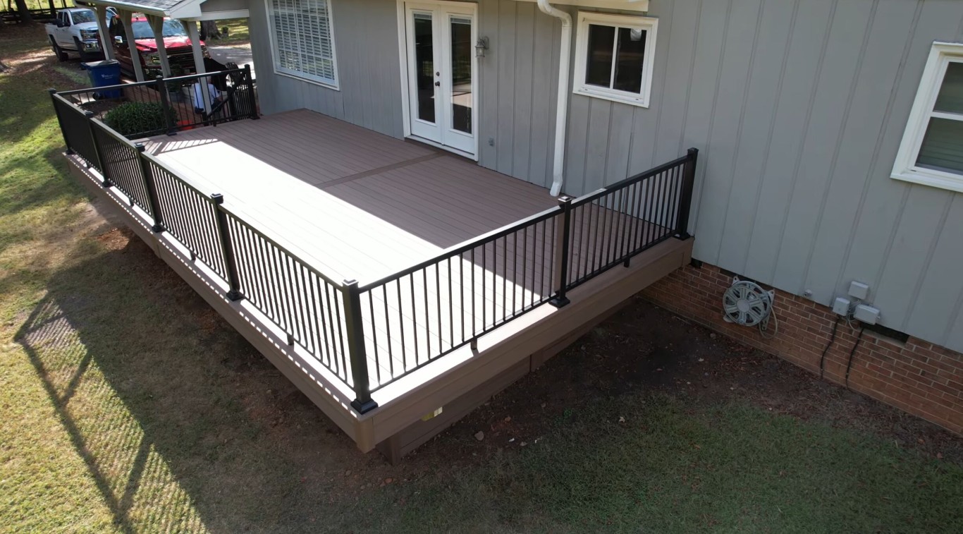 Trusted deck builder completed project with composite deck and black railings in Sunrise Manor